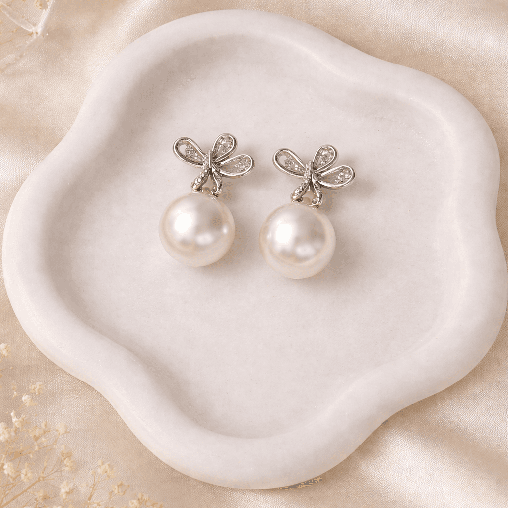 Pearl Bow Drop Earrings - Image 1